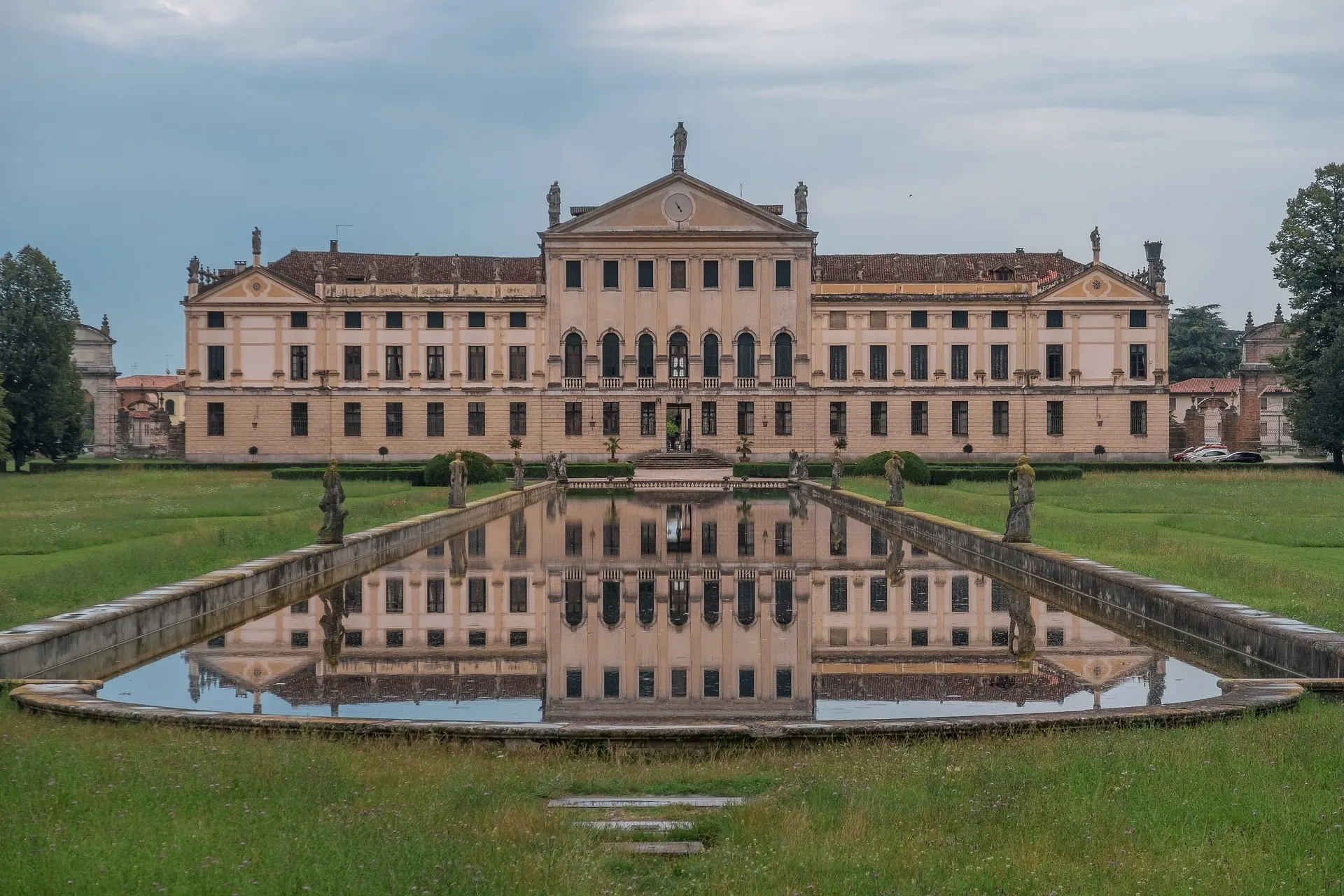 Palladian villa in the Veneto mirrored in its reflecting pool